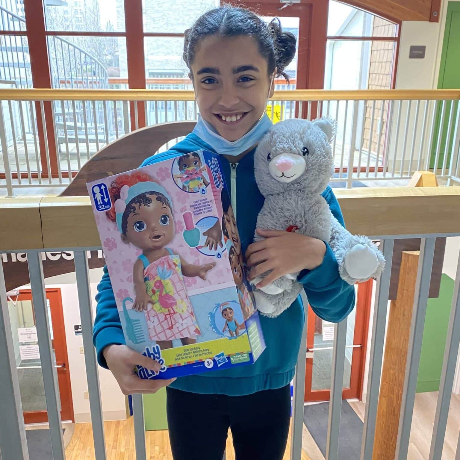 Image of Khloe with her toys